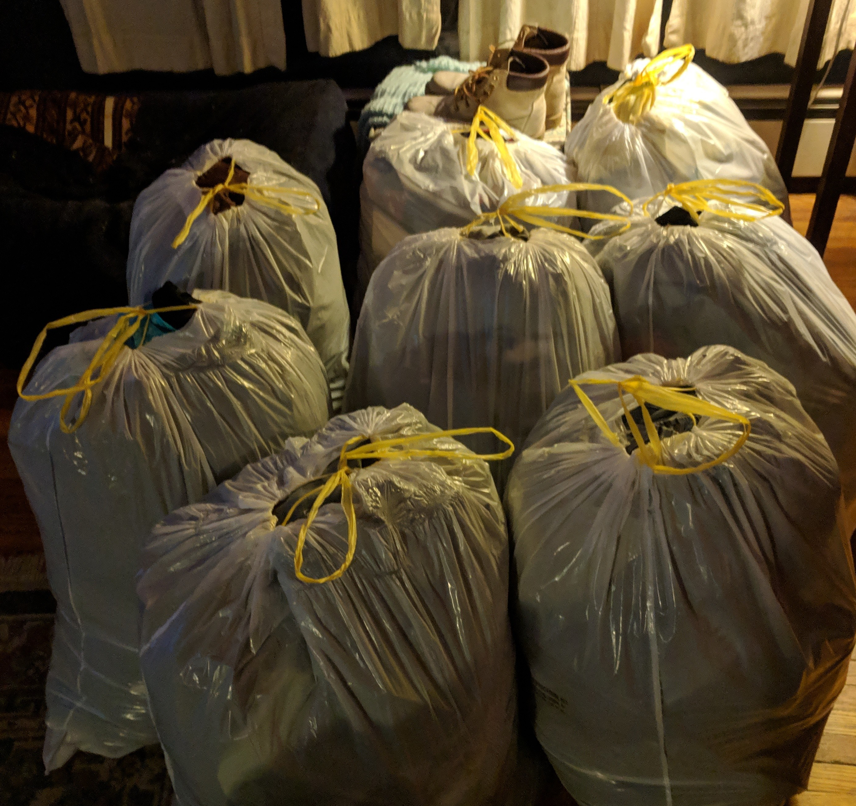 Eight trash bags full of clothing to be donated